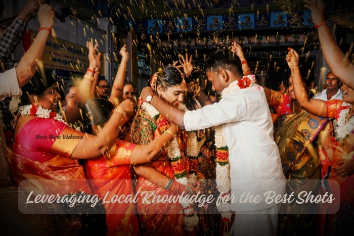 Joyous bridal couple being showered with petals in Coimbatore, a lively shot by Bee Bee Videos utilizing local knowledge for the perfect wedding photography.