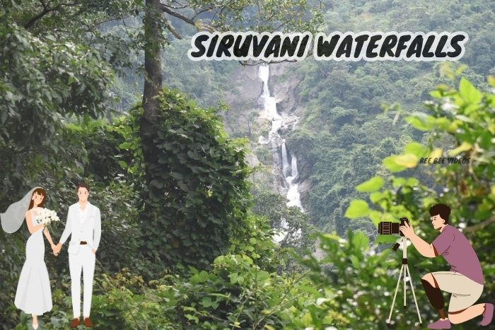 Newlyweds posing for pre-wedding photography with the majestic Siruvani Waterfalls as a backdrop, captured by a professional photographer from Bee Bee Videos, Coimbatore
