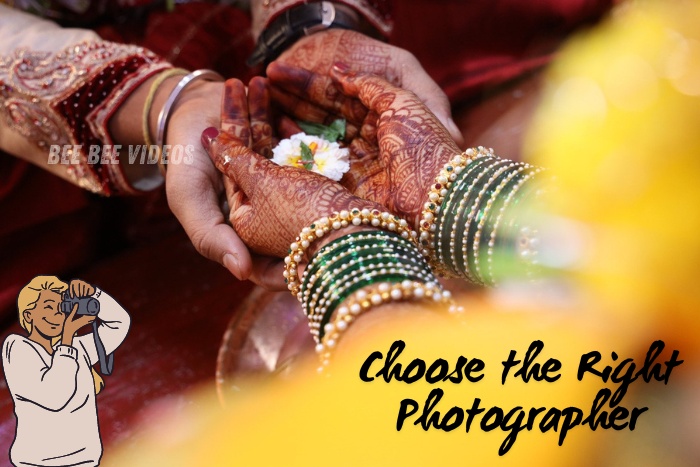 Close-up of Indian bride and groom's hands during a traditional wedding ceremony, capturing intricate henna and vibrant bangles, photographed by Bee Bee Videos, Coimbatore's choice for culturally rich wedding photography