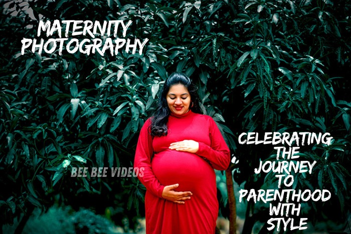 Pregnant woman in a red dress posing in a lush green garden, celebrating the journey to parenthood with style, captured by Bee Bee Videos, leading maternity photographers in Coimbatore