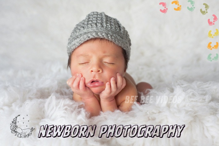Peaceful newborn baby in a gray knitted hat sleeping on a fluffy white blanket, photographed by Bee Bee Videos, professional newborn photography experts in Coimbatore