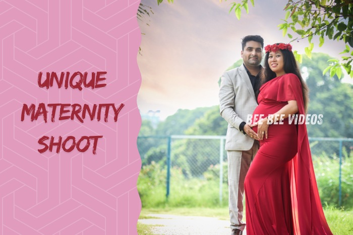 Happy couple posing for a unique maternity shoot in a lush green outdoor setting, captured by Bee Bee Videos & Photography in Coimbatore, highlighting the beauty and joy of expecting parents