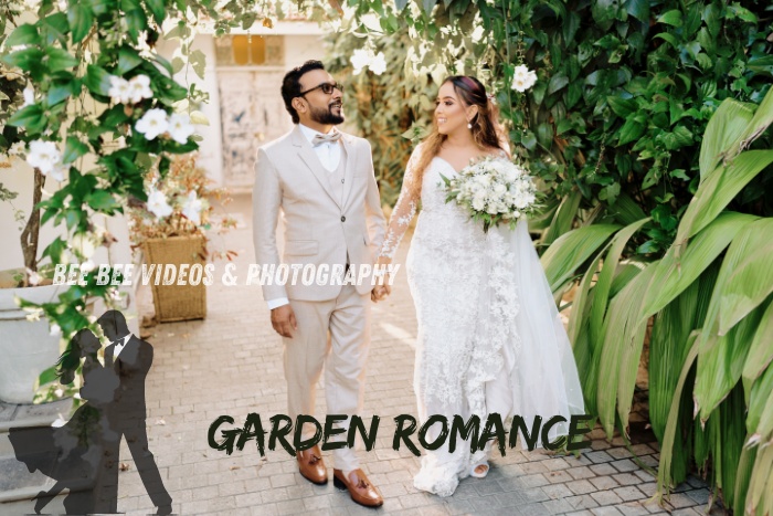 Bee Bee Videos & Photography in Coimbatore: Capture your garden romance. Bride and groom walking hand-in-hand through a lush, flower-filled garden, symbolizing love and elegance in wedding photography