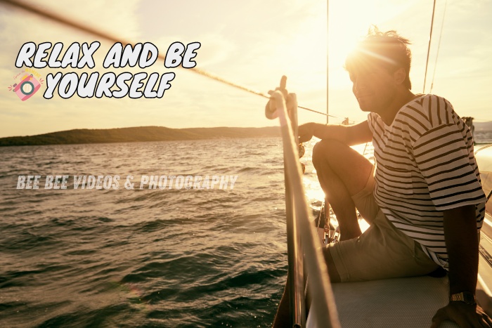 Man relaxing on a sailboat at sunset, captured by Bee Bee Videos & Photography in Coimbatore, emphasizing the importance of being yourself and enjoying the moment during a photoshoot