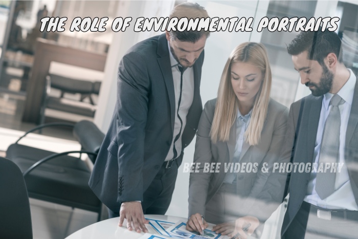 Professional team reviewing documents in a modern office setting, highlighting the importance of environmental portraits in showcasing workplace culture and professionalism. Bee Bee Videos & Photography in Coimbatore offers specialized corporate photography services to capture authentic and dynamic workplace moments