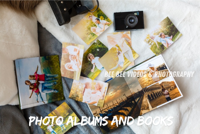 Collection of vibrant photo prints and albums beautifully displayed, showcasing cherished memories captured by Bee Bee Videos & Photography in Coimbatore. Perfect for preserving special moments in timeless photo books