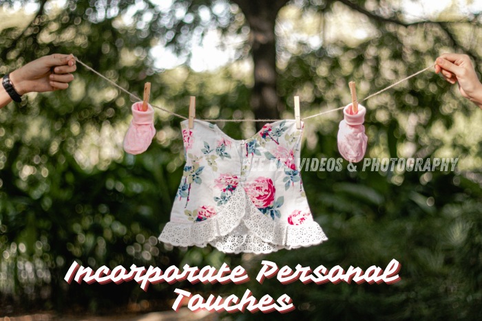 Bee Bee Videos & Photography in Coimbatore adds personal touches to maternity photography, featuring baby clothes and accessories on a clothesline. Professional maternity photography with personalized elements to celebrate the journey of parenthood