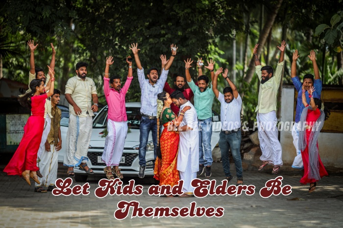 Joyful wedding candid moment with kids and elders jumping in celebration, captured by Bee Bee Videos & Photography in Coimbatore
