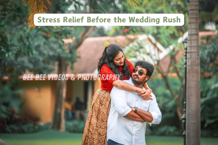 Captured by Bee Bee Videos & Photography in Coimbatore at Couple enjoying playful moments in a garden setting before their big day