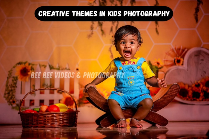 Cute toddler sitting on a wooden prop with joyful expression in a warm, creative studio setup
